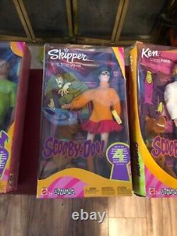 Ensemble complet de 4 poupées de personnages de Scooby Doo, elles sont en excellent état NIB