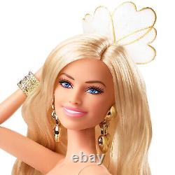 Poupée Barbie de collection du film portant une combinaison disco dorée