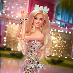 Poupée Barbie de collection du film portant une combinaison disco dorée